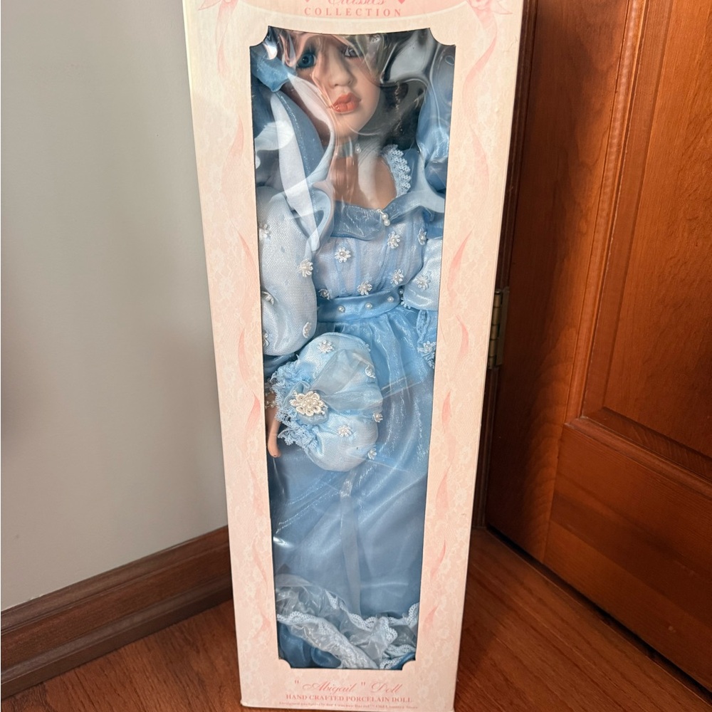 NIB Elegant Blue Porcelain Doll - “Abigail Doll”
